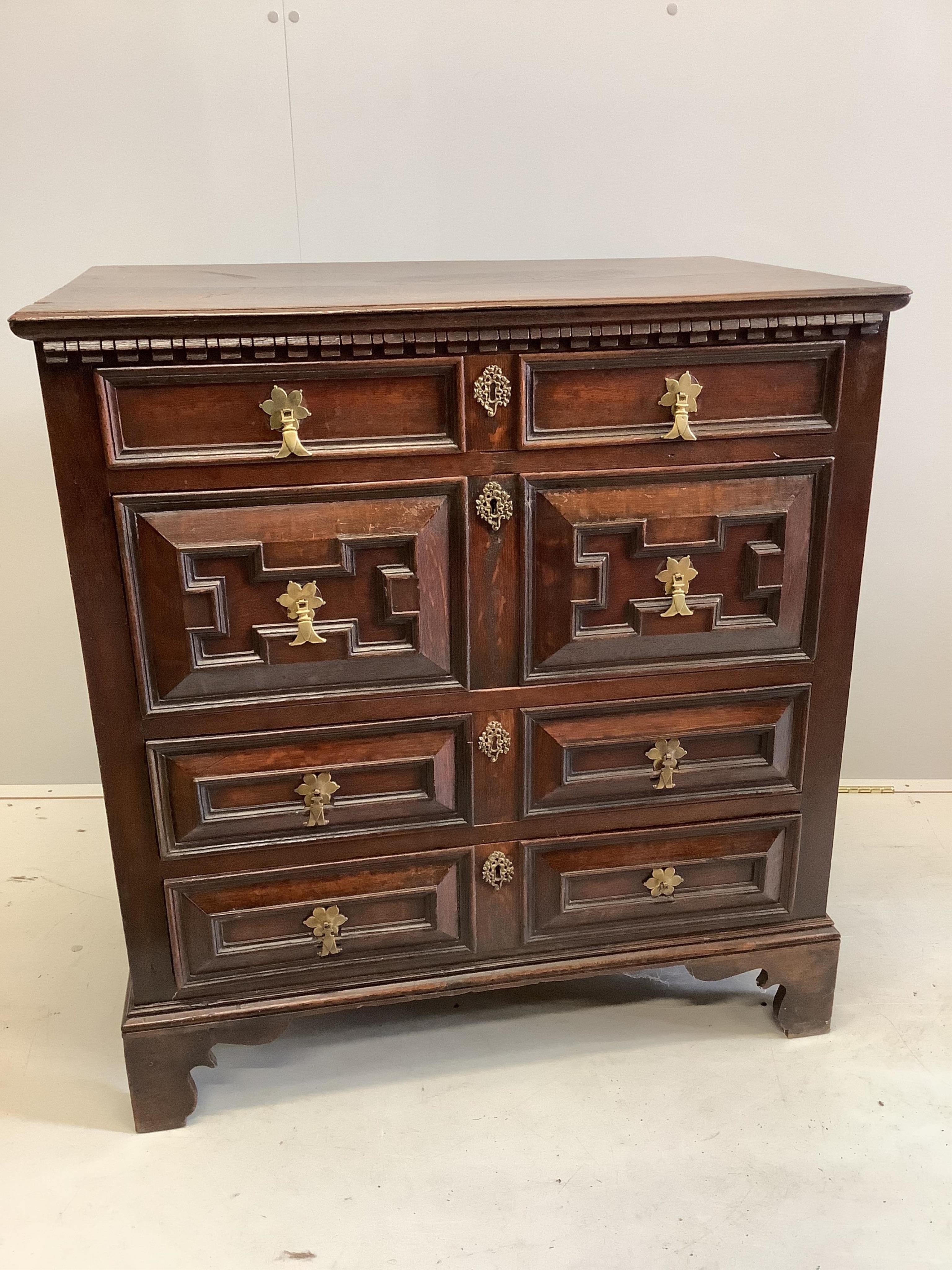 A Jacobean oak chest of drawers, width 91cm, depth 58cm, height 99cm. Condition - fair